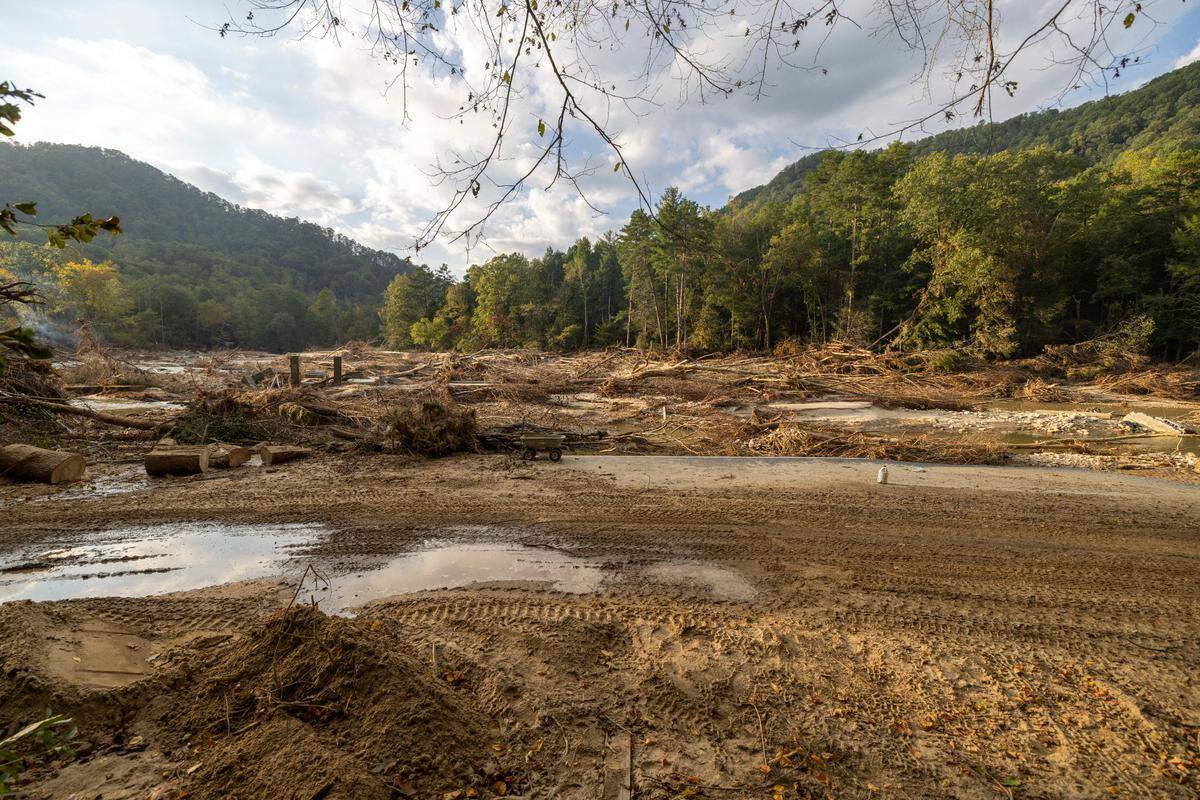 The view of the Green River Valley from Susan Figetakis’ property along Green River Cove Road on Monday, October 7, 2024, near Saluda, N.C. The view would normally include five buildings, all of which were destroyed by flood waters from Hurricane Helene.