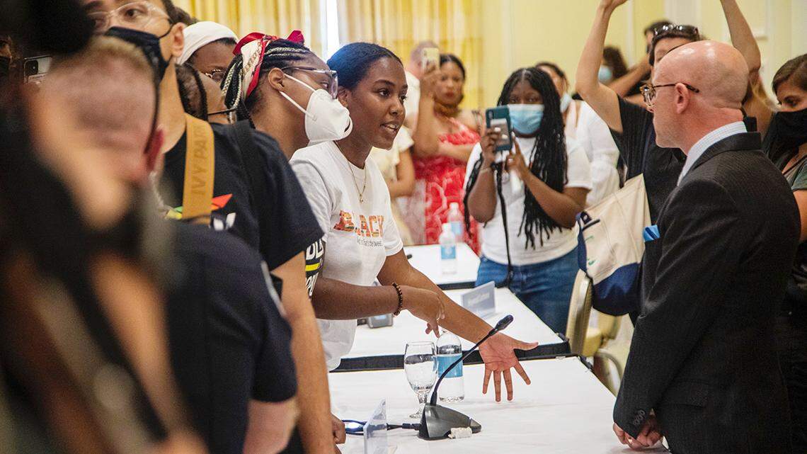 Demonstrators confront Gene Davis, vice chairman of the UNC-Chapel Hill Board of Trustees, after the board voted to approve tenure for distinguished journalist Nikole Hannah-Jones Wednesday, June 30, 2021 at Carolina Inn in chapel Hill.