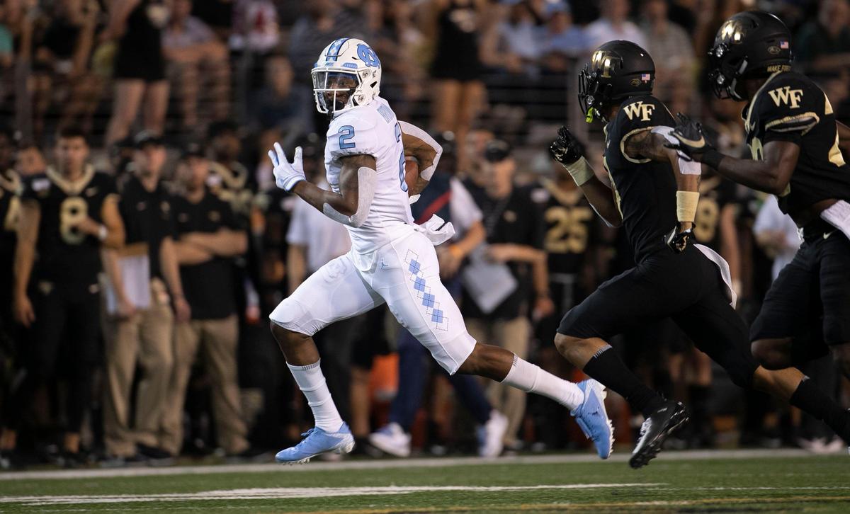 North Carolinas Dyami Brown (2) picks up 12 yards after a pass reception from quarterback Sam Howell in the fourth quarter against Wake Forest on Friday, September 13, 2019 at BB&T Field in Winston-Salem, N.C.