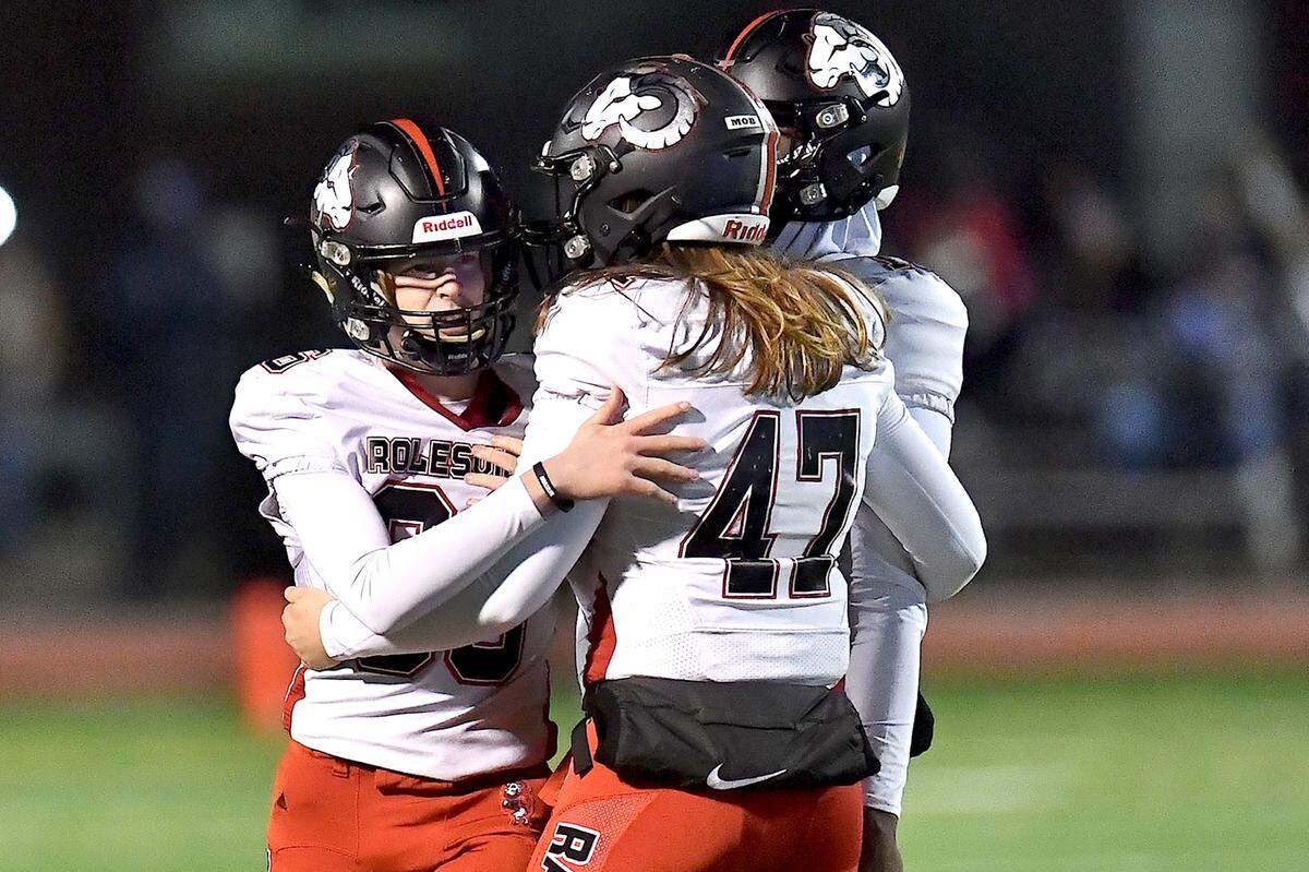 Rolesville kicker Riley Daniels (36) celebrates with teammates after kicking a 42-yard field goal against Cardinal Gibbons during the second half. The Rolesville Rams and the Cardinal Gibbons Crusaders met in the East Regional Final of the NCHSAA 4A football playoffs in Raleigh, N.C. on December 13, 2024.