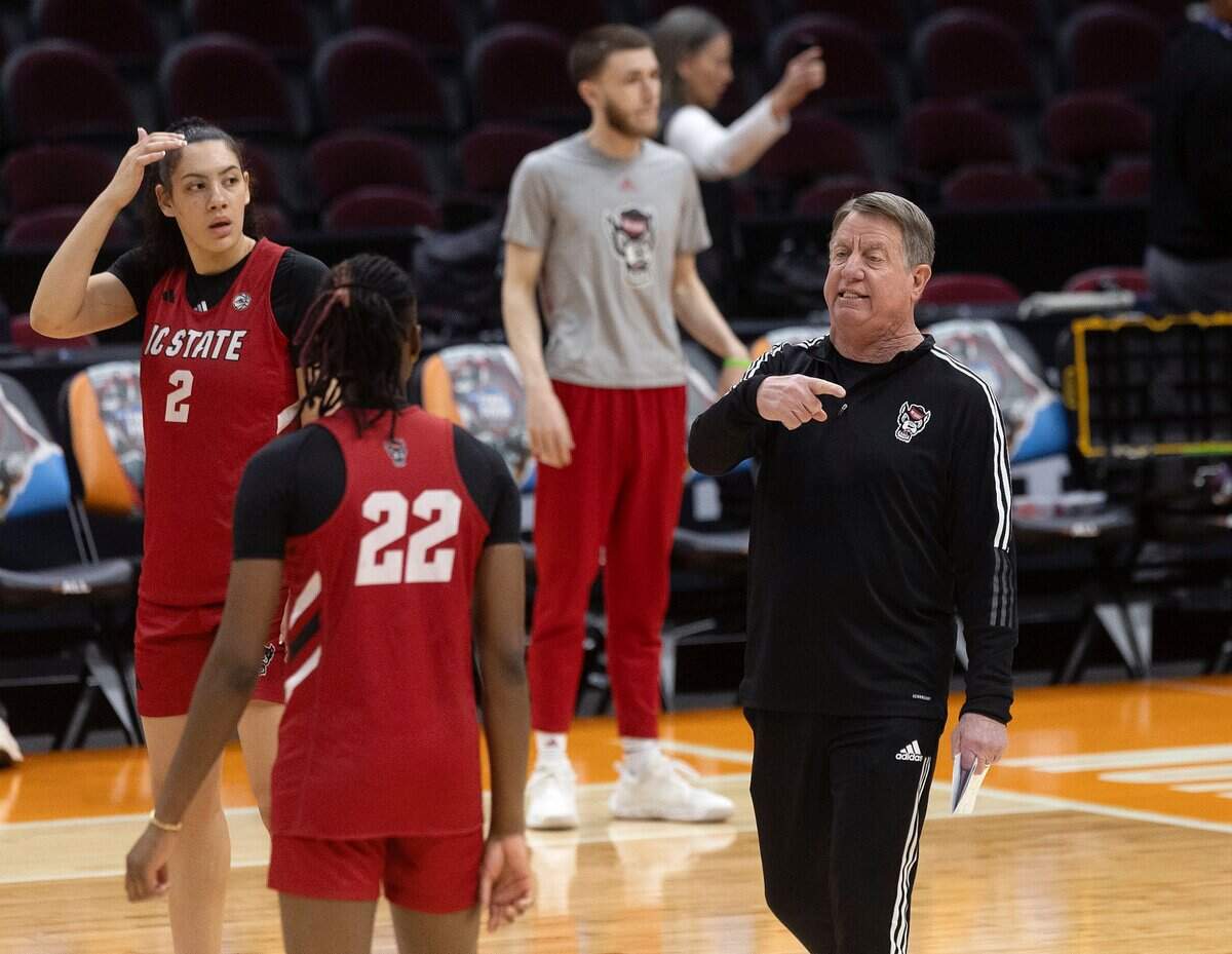 N.C. State head coach Wes Moore gives instructions during practice at Rocket Mortgage FieldHouse on Thursday, April 4, 2024, in Cleveland, Ohio. The Wolfpack will face South Carolina in the Final Four on Friday.