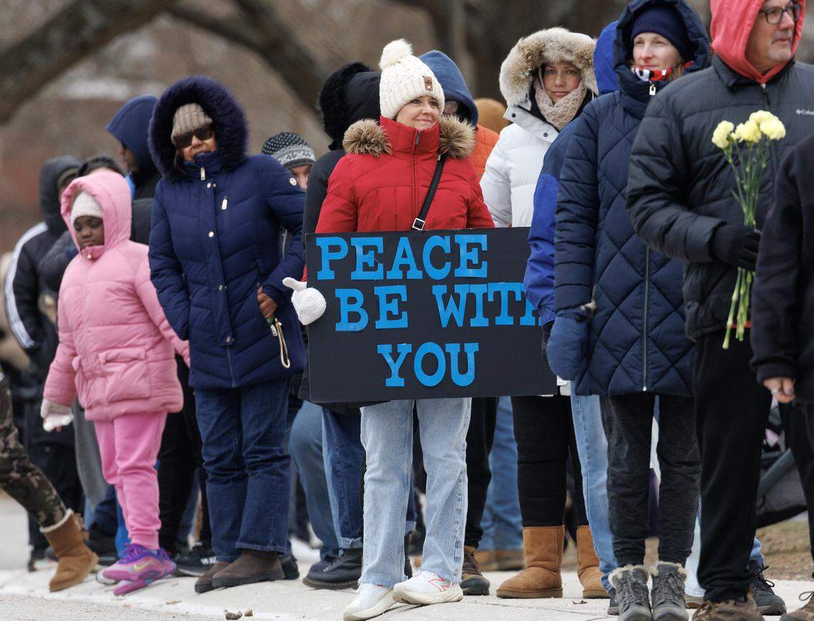 Crowds line Umstead Drive while awaiting a procession of Buddhist monks at Dorothea Dix Park as a part of the Walk for Peace on Saturday.