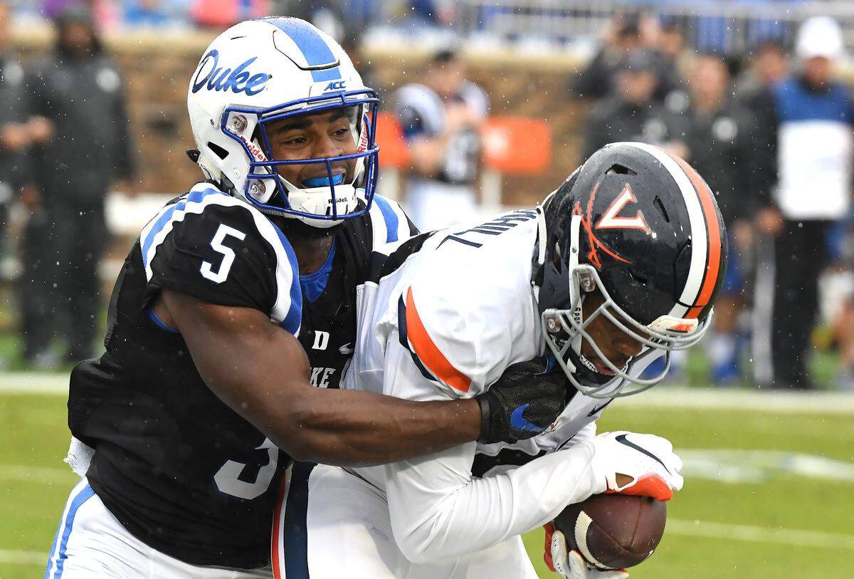 Virginia safety Juan Thornhill (21) intercepts a pass in the end zone intended for Duke wide receiver Johnathan Lloyd (5) in the second quarter. 