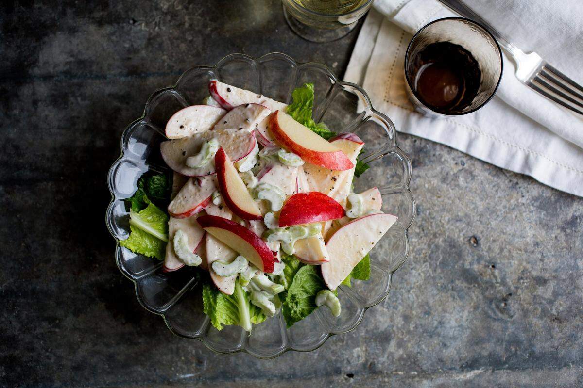 The original Waldorf salad, simply lettuce, diced apples and celery tossed in a good-quality mayonnaise, in New York, Feb. 13, 2017. T