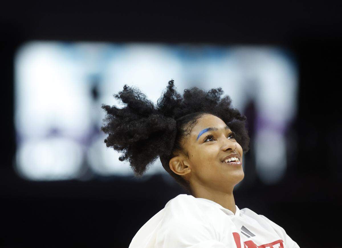 N.C. State’s Qadence Samuels smiles while warming up prior to the Wolfpack’s game against Southern California on Sunday, Nov. 9, 2025, at Spectrum Center in Charlotte, N.C.