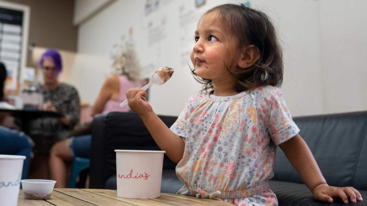 Zara Mathir, 20 months old, enjoys Andias Homemade Ice Cream in Cary, N.C. on Tuesday, Aug. 2, 2022.