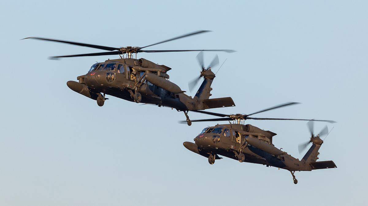 A file photo of shows a pair of UH-60 Black Hawk helicopters.