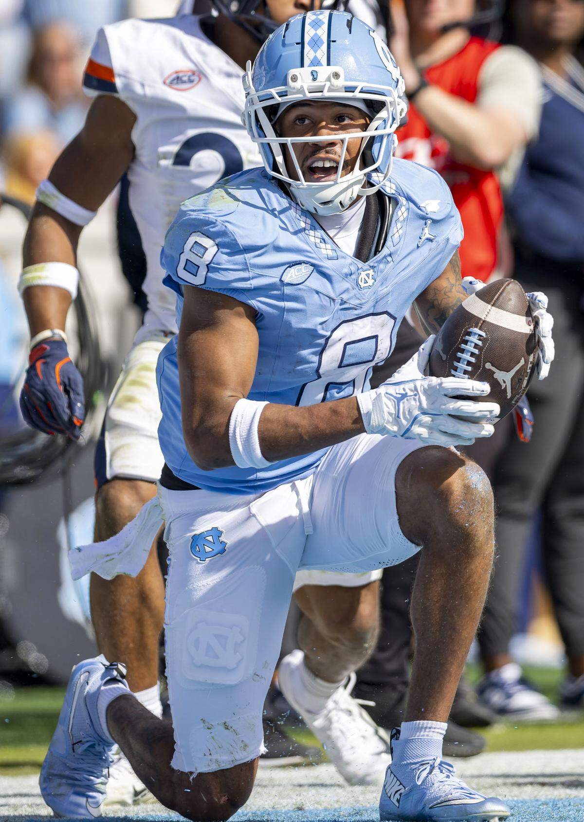 North Carolina wide receiver Kobe Paysour (8) reacts after 26-yard pass reception from quarterback Gio Lopez in the second quarter to set up a touchdown on the next play against Virginia on Saturday, October 25, 2025 at Kenan Stadium in Chapel Hill, N.C