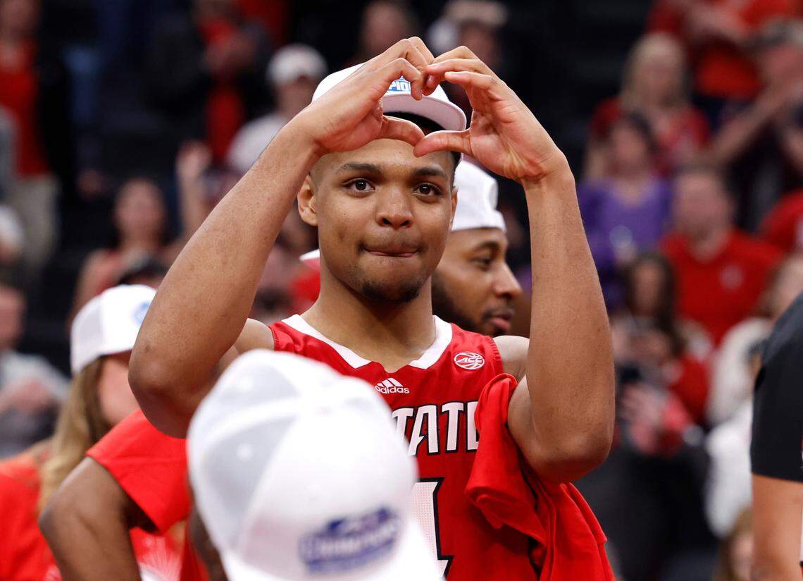 N.C. State’s Casey Morsell (14) responds to the crowd after N.C. State’s 84-76 victory over UNC in the championship game of the 2024 ACC Men’s Basketball Tournament at Capital One Arena in Washington, D.C., Saturday, March 16, 2024.
