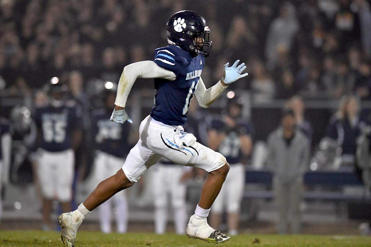 Millbrook strong safety Cairo Williams (11) sprints downfield during a play against Jordan during the first half. The Millbrook Wildcats and the Jordan Falcons met in the third round of the NCHSAA 8A football playoffs in Raleigh, N.C. on November 21, 2025.