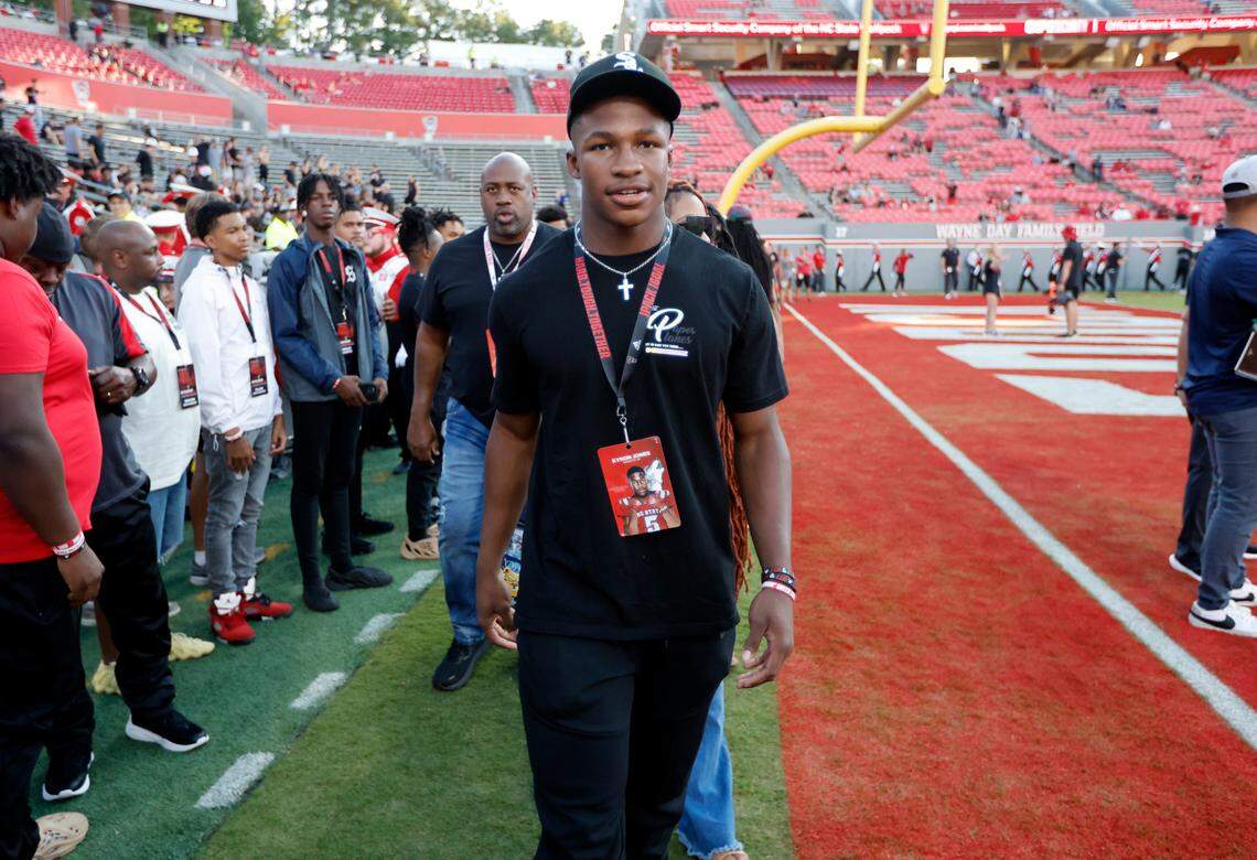 Kyron Jones walks onto the field before N.C. State’s game against Texas Tech at Carter-Finley Stadium in Raleigh, N.C., Saturday, Sept. 17, 2022.