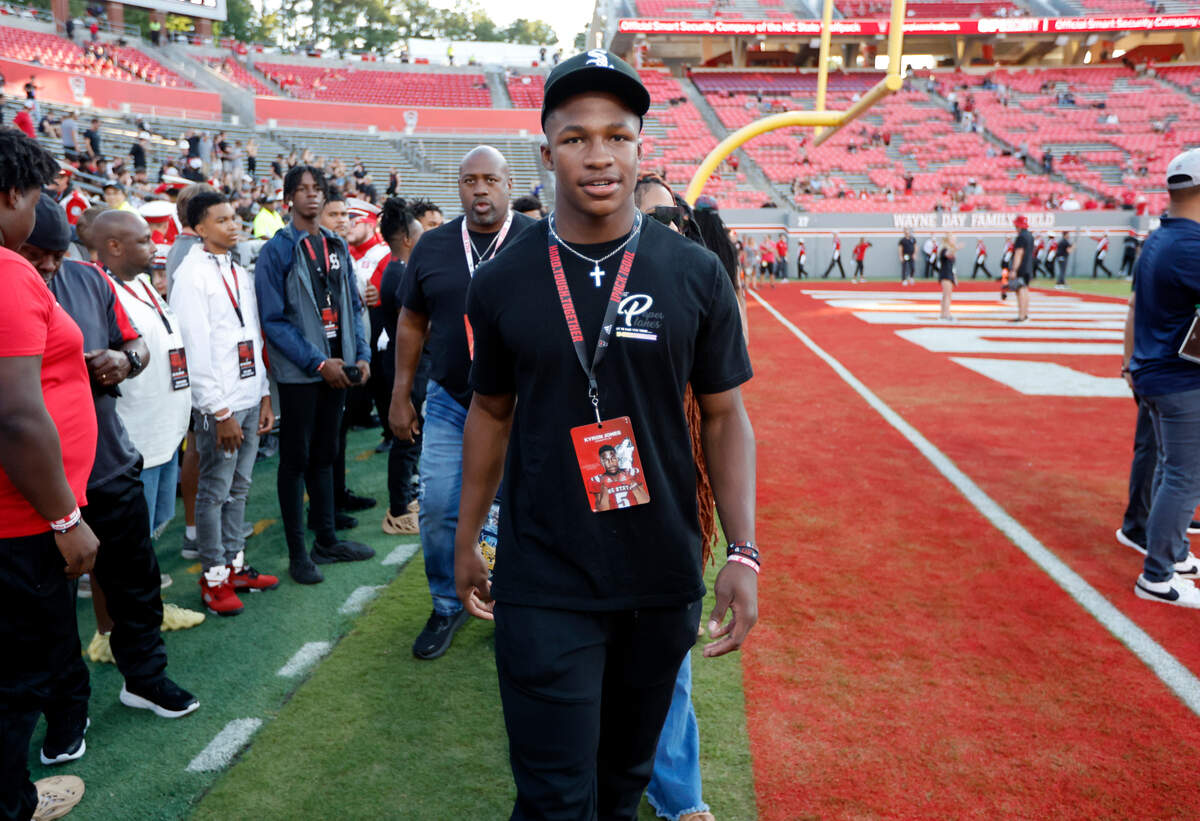 Kyron Jones walks onto the field before N.C. State’s game against Texas Tech at Carter-Finley Stadium in Raleigh, N.C., Saturday, Sept. 17, 2022.