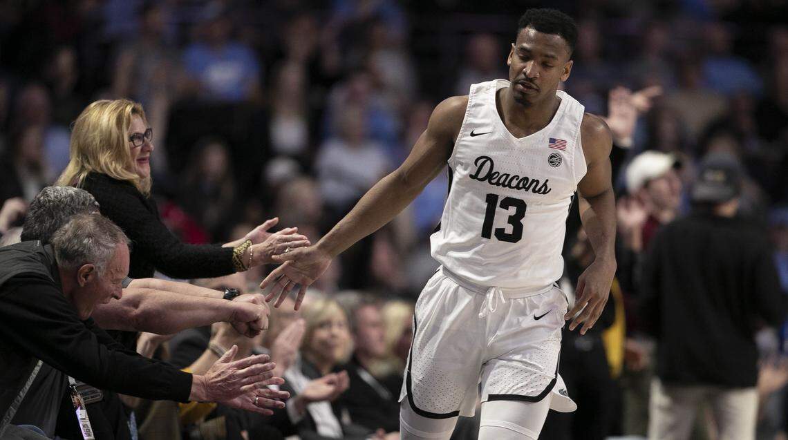 Wake Forest’s Andrien White (13) celebrates with fans after a three point basket in the first half against North Carolina on Tuesday, February 11, 2020 at Lawrence Joel Coliseum in Winston-Salem, N.C.