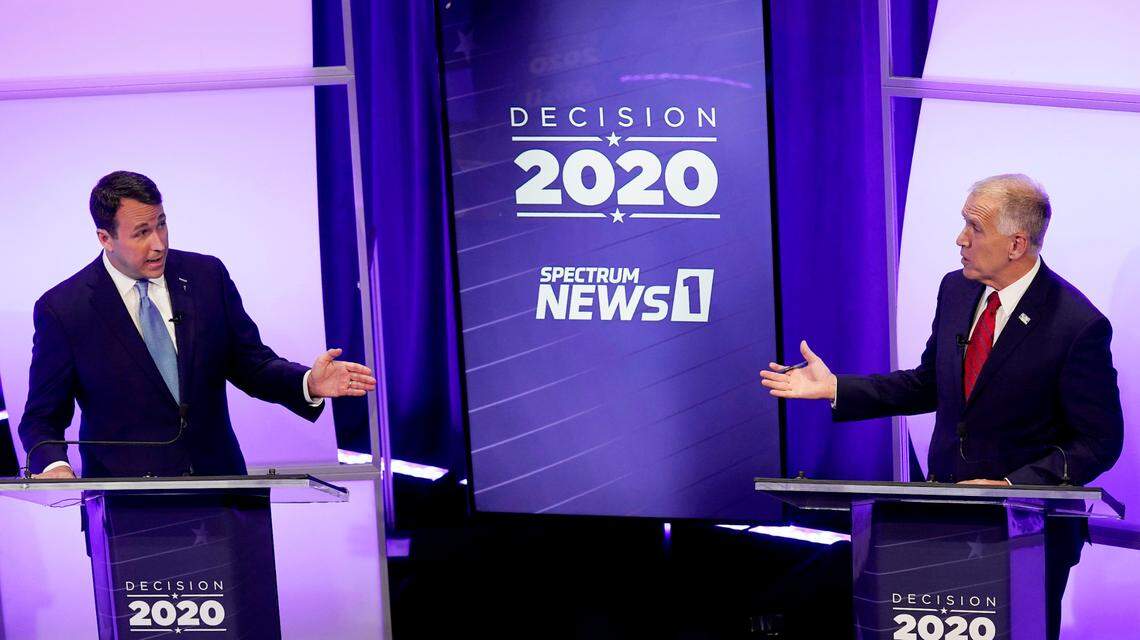 Democratic challenger Cal Cunningham, left, and U.S. Sen. Thom Tillis, R-N.C. talk during a televised debate Thursday, Oct. 1, 2020, in Raleigh, N.C.