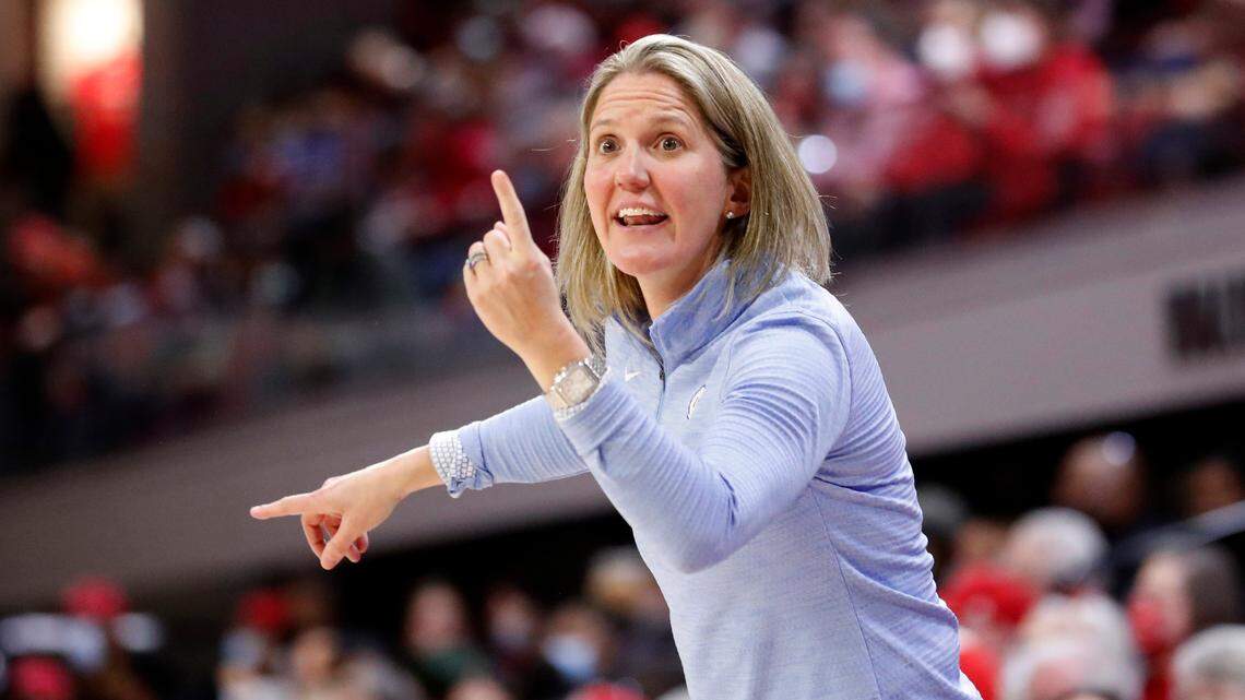 North Carolina head coach Courtney Banghart instructs her players during the first half of N.C. State’s game against UNC at Reynolds Coliseum in Raleigh, N.C., Thursday, January 6, 2022.