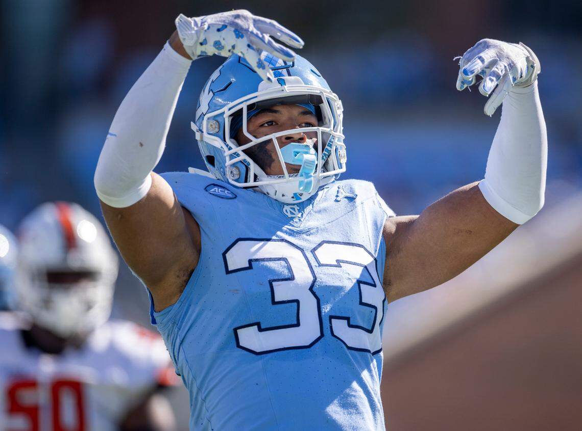 North Carolina’s Cedric Gray (33) reacts after sacking Campbell quarterback Hajj-Malik Williams (6) for a 13-yard loss in the second quarter on Saturday, November 4. 2023 at Kenan Stadium in Chapel Hill, N.C.