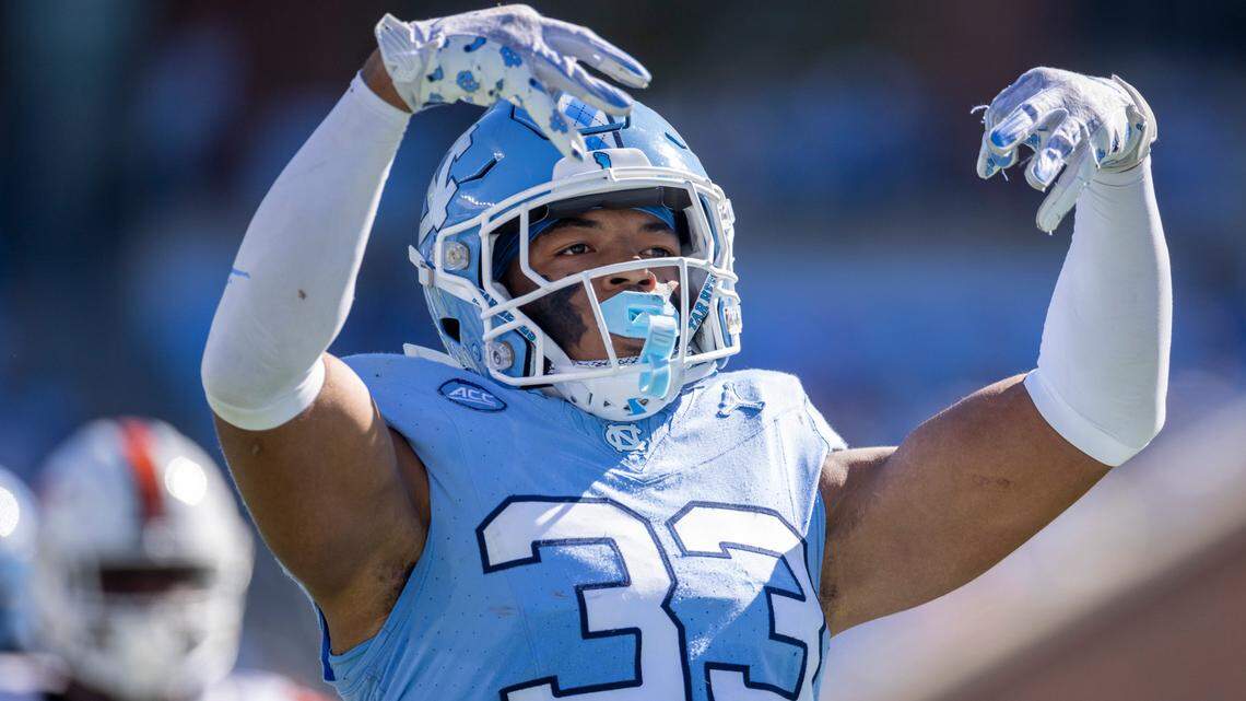 North Carolina’s Cedric Gray (33) reacts after sacking Campbell quarterback Hajj-Malik Williams (6) for a 13-yard loss in the second quarter on Saturday, November 4. 2023 at Kenan Stadium in Chapel Hill, N.C.