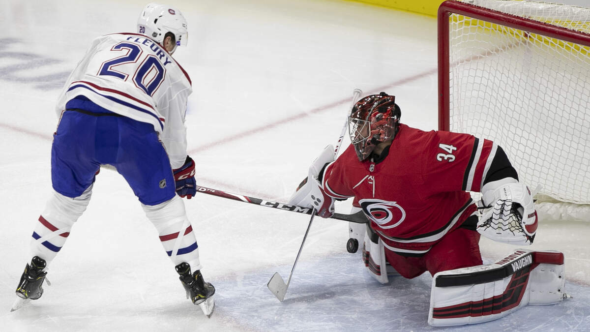 Carolina Hurricanes’ goalie Petr Mrazek (34) stops a shot by Cale Fleury (20) during the shootout n Thursday, October 3, 2019 at the PNC Arena in Raleigh, N.C. Mrazek did not allow any goals during the shootout.