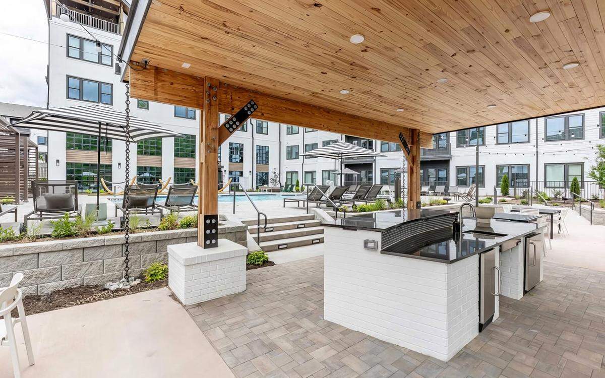 Charlotte-based Crescent Communities’ NOVEL Cary is a for-rent housing community and offers shared amenities, like outdoor grilling stations and a pool.
