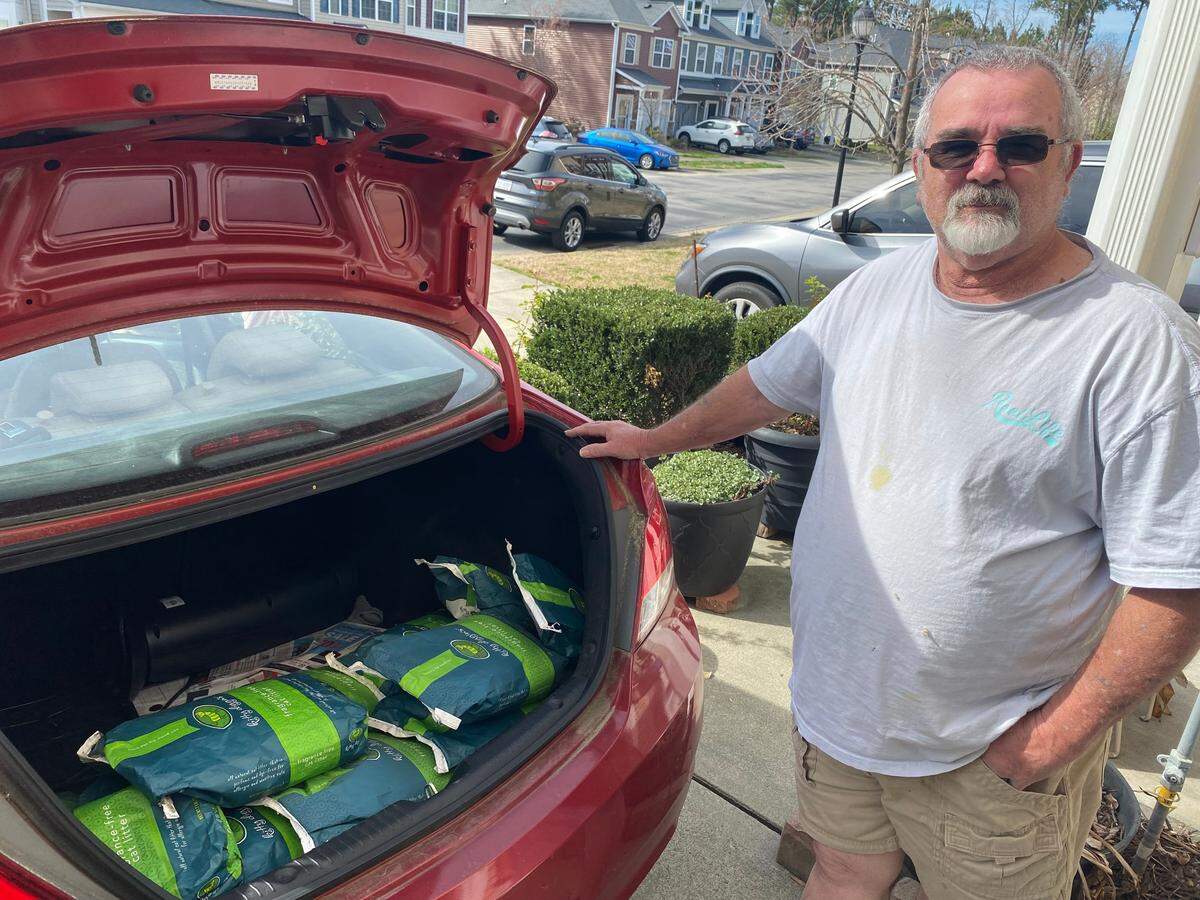 Johnny Clinton and the cat litter he gifted me.