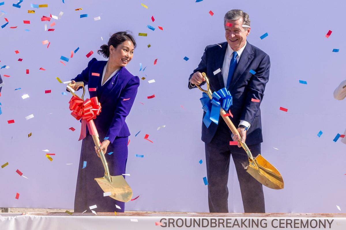 VinFast CEO Le Thi Thu Thuy and Gov. Roy Cooper participate in a a groundbreaking ceremony Friday, July 28, 2023 at the future site of a VinFast plant in Moncure.
