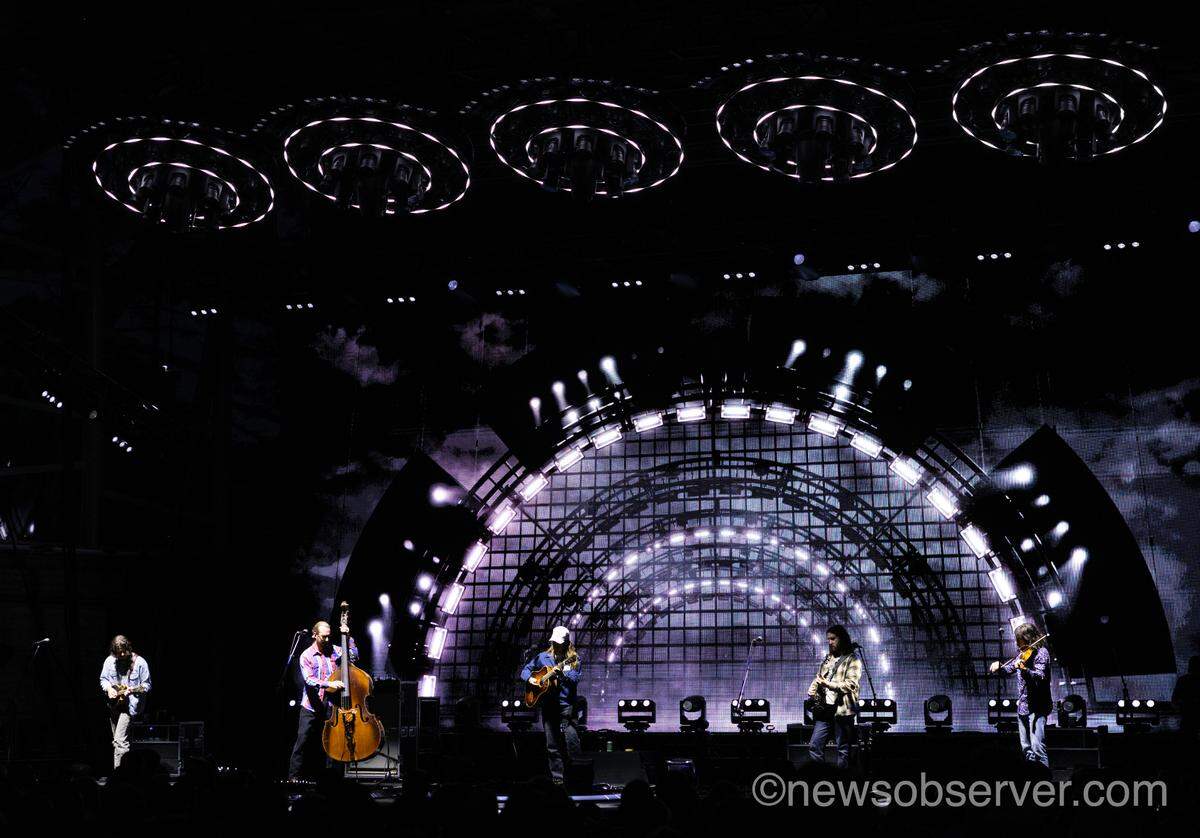 Billy Strings and his band always bring a cosmic light show to their shows, as seen here on their first of three nights in Cary.