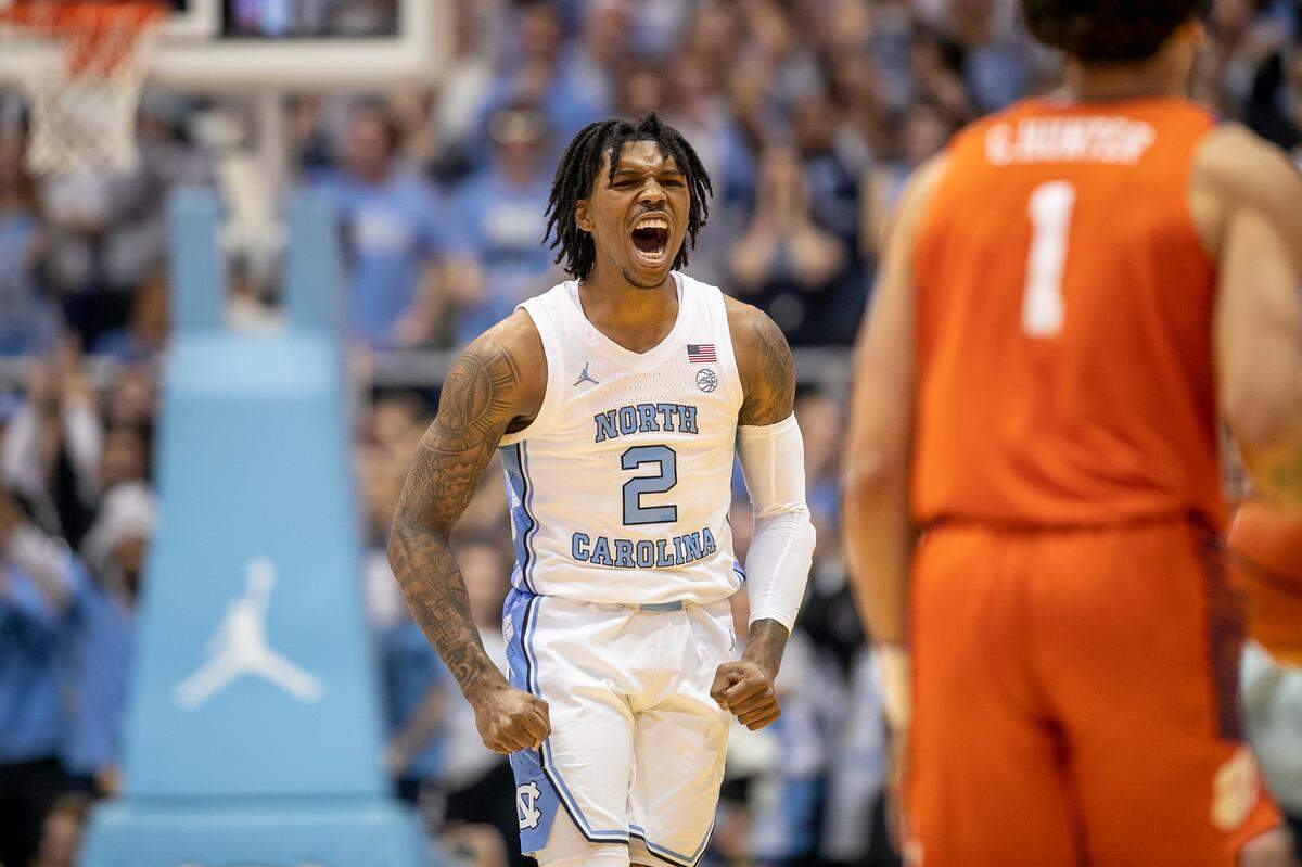 North Carolina’s Caleb Love (2) reacts after sinking a three point basket to give the Tar Heels’ a lead in the first half against Clemson on Saturday, February 11, 2023 at the Smith Center in Chapel Hill , N.C.