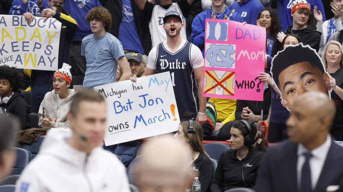 Fans cheer on Duke head coach Jon Scheyer as he is interviewed during Duke basketballÕs open practice on ESPNÕs College GameDay at Capital One Arena in Washington, D.C., Saturday, Feb. 21, 2026.
