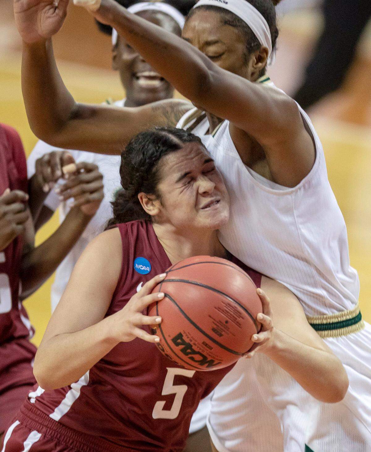 Washington State guard Charlisse Leger-Walker (5) drives against South Florida center Shae Leverett (21) during the second quarter of a college basketball game in the first round of the women’s NCAA tournament at the Frank Erwin Center in Austin, Texas, Sunday, March 21, 2021. 