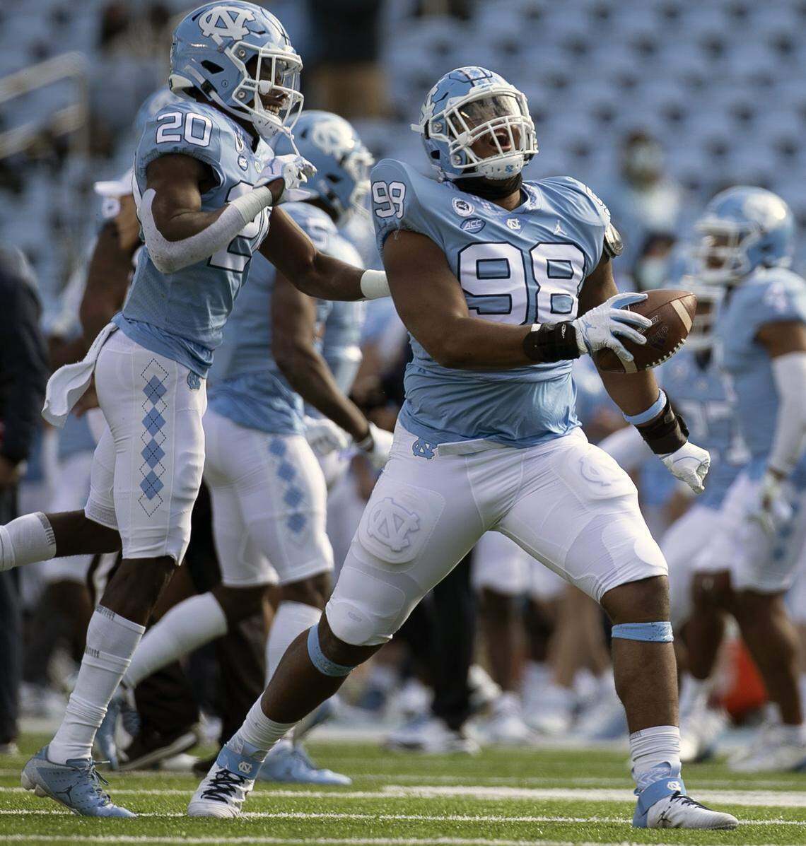 North Carolina’s Kevin Hester Jr. (98) celebrates after recovering a fumble by Western Carolina in the second quarter on Saturday, December 5, 2020 at Kenan Stadium in Chapel Hill, N.C.