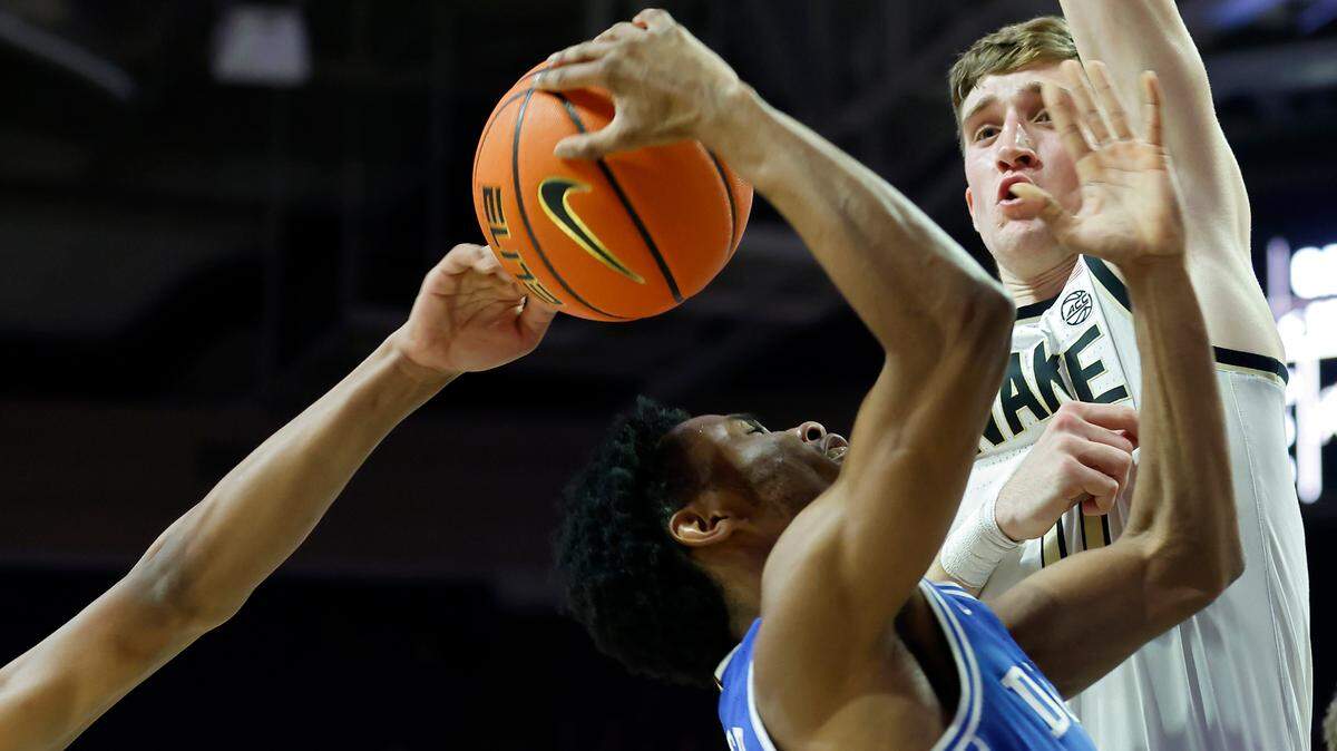 Duke’s Jeremy Roach drives between Wake Forest’s Bobi Klintman and Andrew Carr during the first half of a men’s basketball game on Tuesday, Dec. 20, 2022, at Lawrence Joel Veterans Memorial Coliseum in Winston-Salem, N.C.