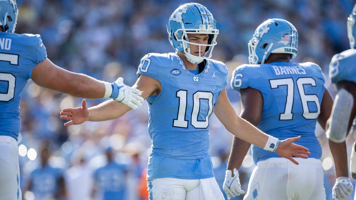North Carolina quarterback Drake Maye (10) congratulates teammates after leading a scoring drive and taking a 21-3 lead over Minnesota in the second quarter on Saturday, September 16, 2023 at Kenan Stadium in Chapel Hill N.C.