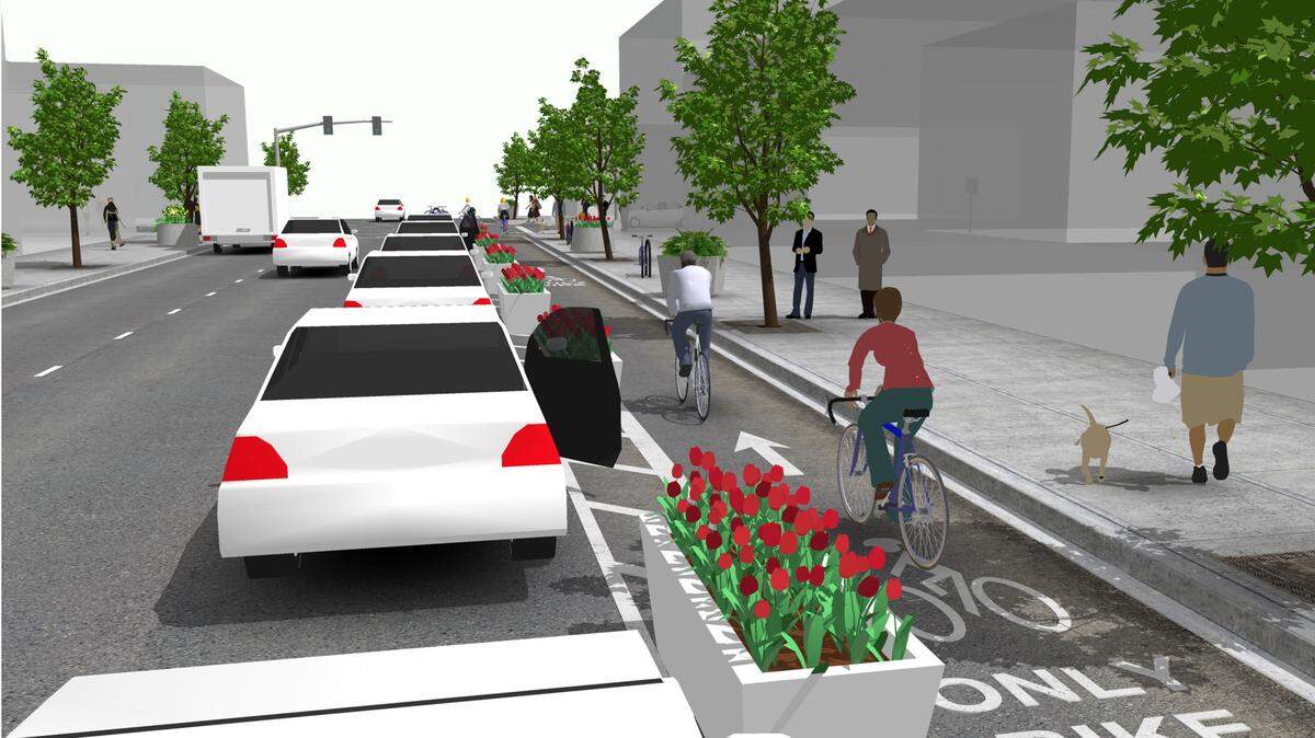 The City of Raleigh is proposing to build a bike lane between parked cars and the curb along the west side of Oberlin Road near Cameron Village, the first design of its type in the city. This diagram of a parking-protected bike lane comes from the Urban Bikeway Design Guide published by the National Association of City Transportation Officials or NATCO.