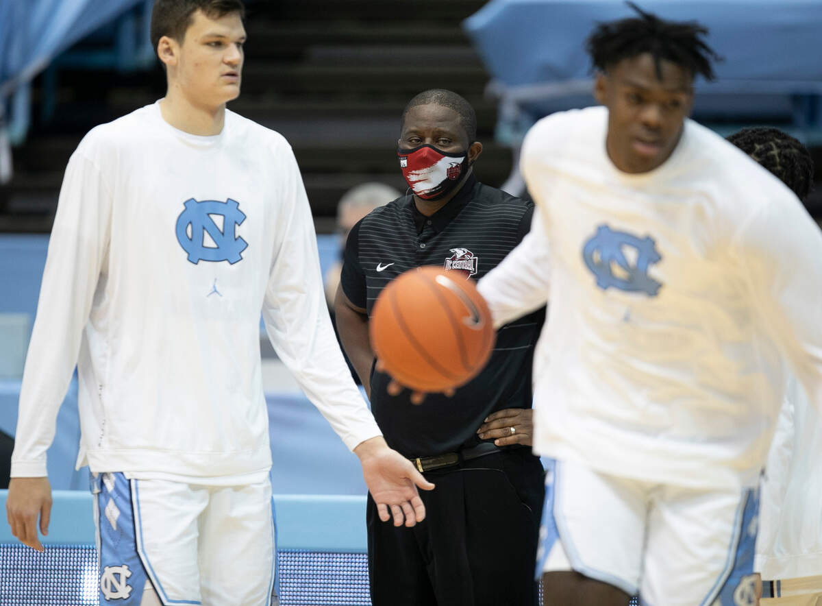 North Carolina Central University head coach LeVelle Moton watches the Tar Heels warm up prior to their game on Saturday, December 12, 2020 at the Smith Center in Chapel Hill, N.C.