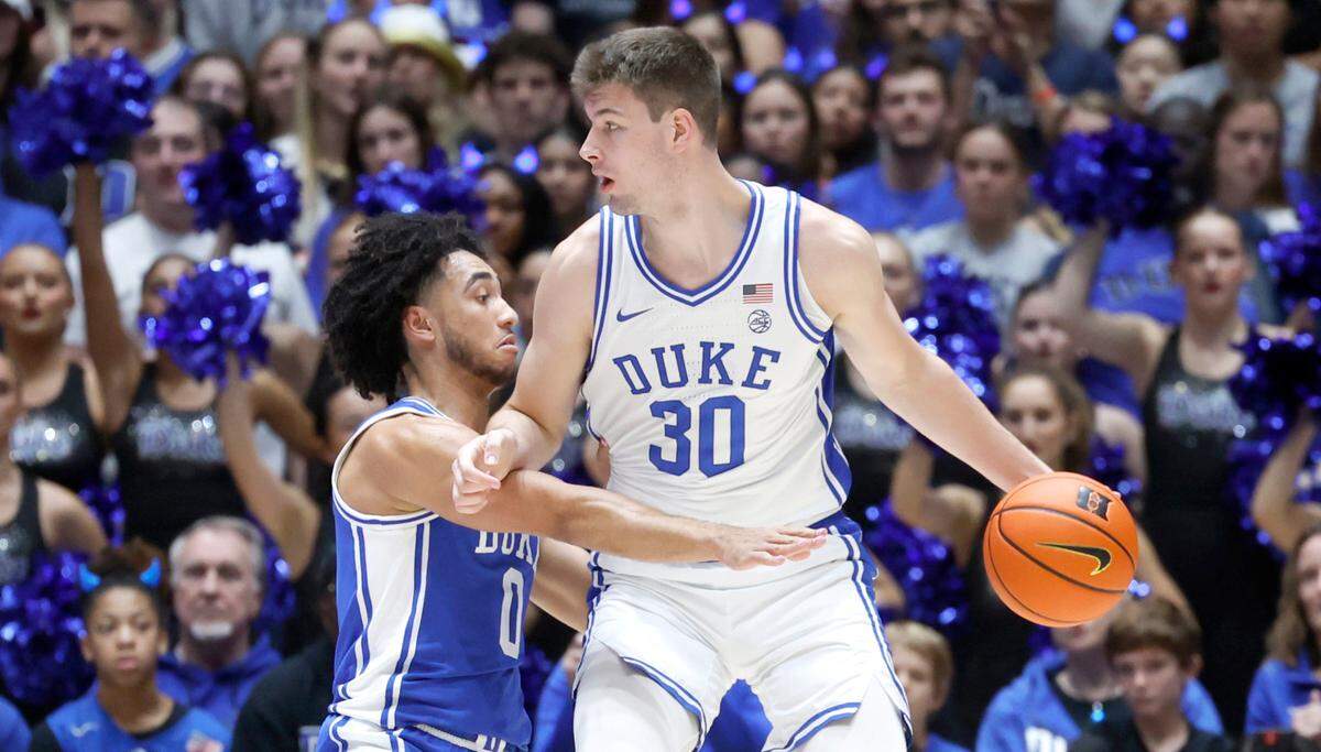 Duke’s Jared McCain (0) defends Kyle Filipowski (30) in a scrimmage during Countdown to Craziness at Cameron Indoor Stadium in Durham, N.C., Friday, Oct. 20, 2023.