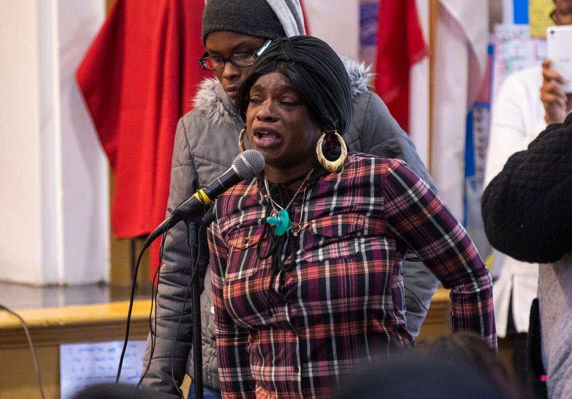 Brittney Brown, a resident of McDougald Terrace addresses Durham Housing Authority Chief Executive Officer Anthony Scott during a community meeting held after seven carbon monoxide poisonings were reported at McDougald Terrace within in 30 days and two infant deaths reported, which were unrelated to the carbon monoxide according to the Durham Fire Department, at Burton Elementary School on Thursday, Jan. 2, 2020, in Durham, NC.