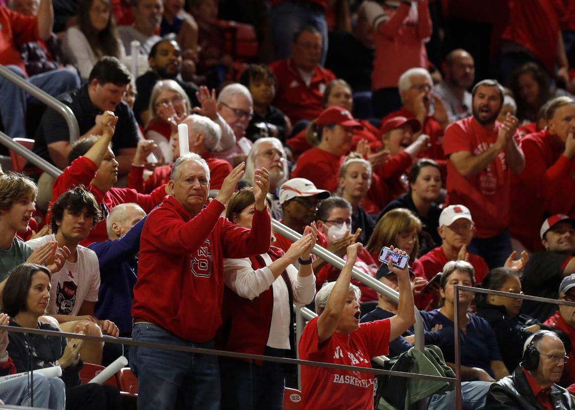 Fans react during the second half of N.C. State’s 92-81 win over UConn on Sunday, Nov. 12, 2023, at Reynolds Coliseum in Raleigh, N.C.