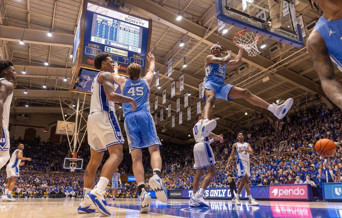 North Carolinas Armando Bacot dunks to give the Tar Heels a commanding 86-76 lead over Duke with :56 seconds to play on Saturday, March 5, 2022 in Durham, N.C. Bacot lead the Tar Heels with 23 points.