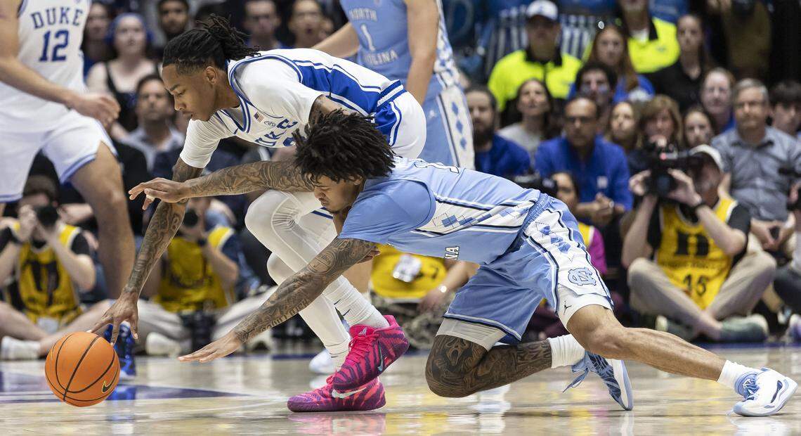 Duke forward Isaiah Evans (3) makes a steal from North Carolina guard Jonathan Powell (11) in the first half on Saturday, March 7, 2026 at Cameron Indoor Stadium in Durham, N.C.