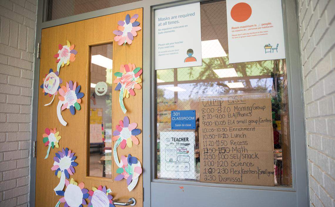 A daily schedule is posted outside a classroom a Eno Valley Elementary School in Durham, N.C., pictured here on Monday, June 21, 2021. The program, referred to as “Camp Eno Valley,” is geared towards providing a summer camp environment for Durham students who may have fallen behind in school during the COVID-19 pandemic.