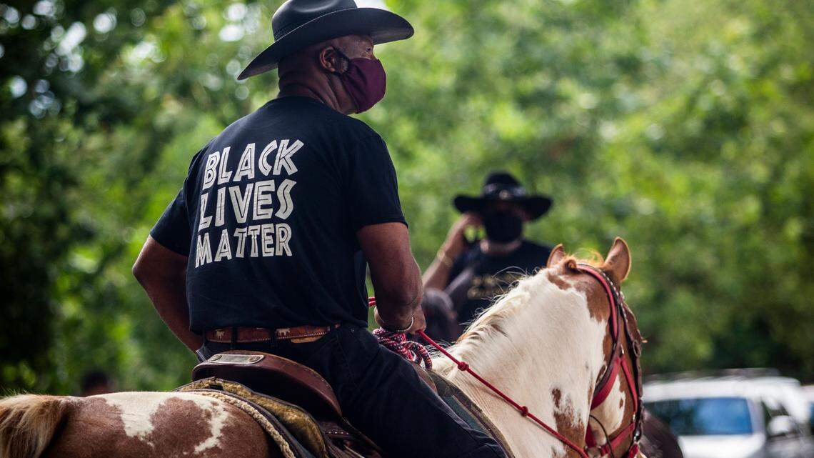 Black Lives Matter demonstrators on horseback prepare to ride through downtown Raleigh Friday, June 19, 2020 in recognition of Juneteenth.