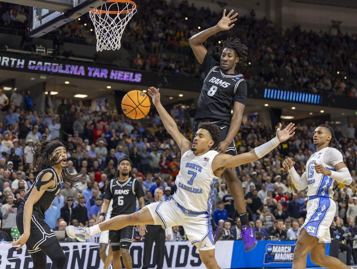 North Carolina guard Seth Trimble (7) looses control of the ball in overtime against VCU on Thursday, March 18, 2026, during the first round of the NCAA Tournament at Bon Secours Arena in Greenville, S.C.