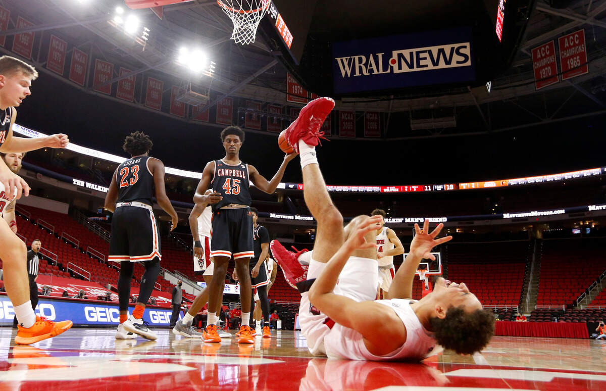 N.C. State’s Jericole Hellems (4) reacts after his shot didn’t fall after being fouled during N.C. State’s 69-50 victory over Campbell at PNC Arena in Raleigh, N.C., Saturday, Dec. 19, 2020.