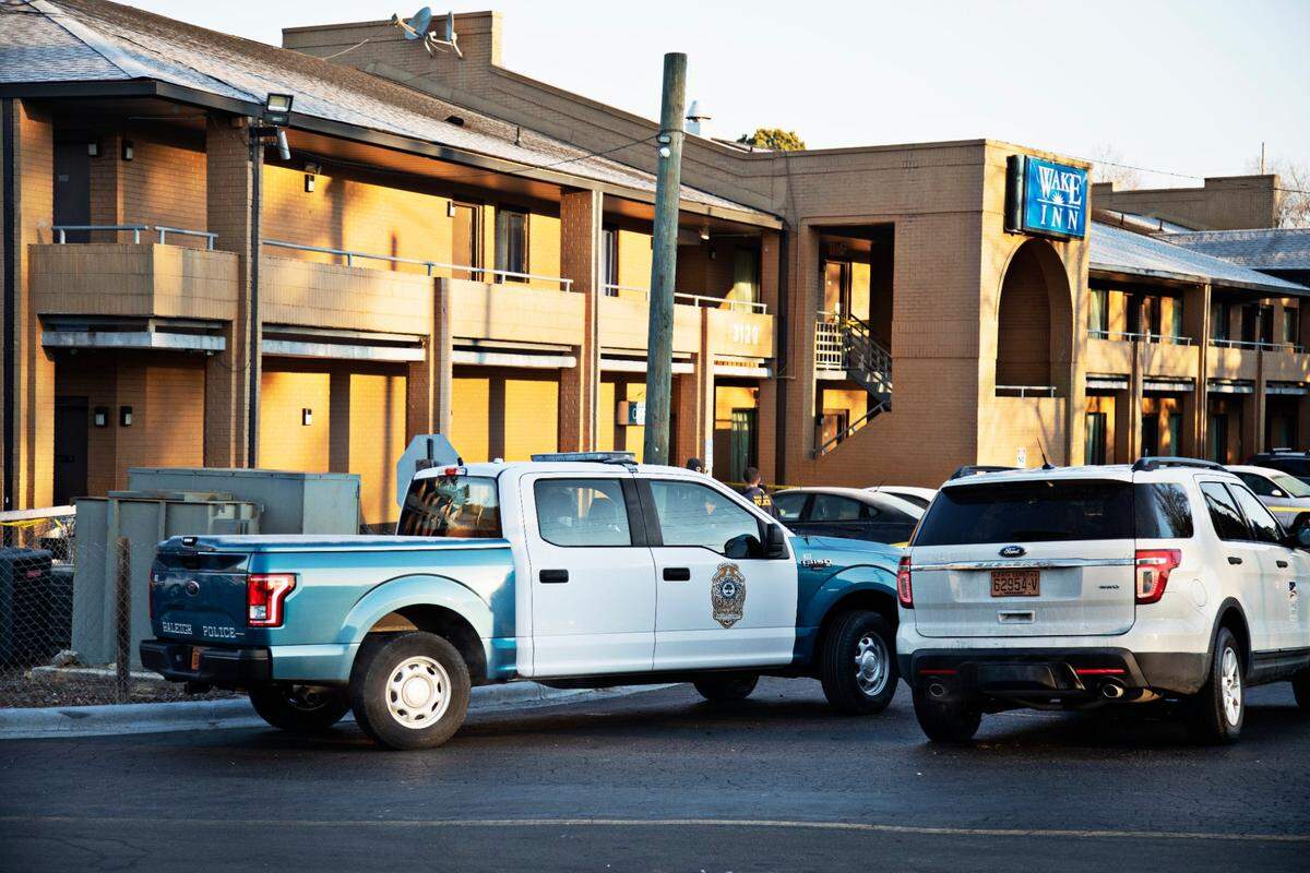 Four people were injured during a Monday night shooting at the Wake Inn on New Bern Ave. in Raleigh. Police were on the scene early Tuesday morning, Feb. 1, 2022.