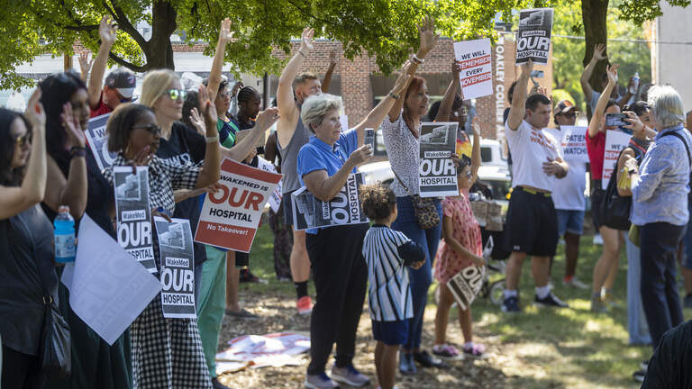 WakeMed-Atrium Health merger critics rally ahead of Wake vote: ‘This is a bad deal.’