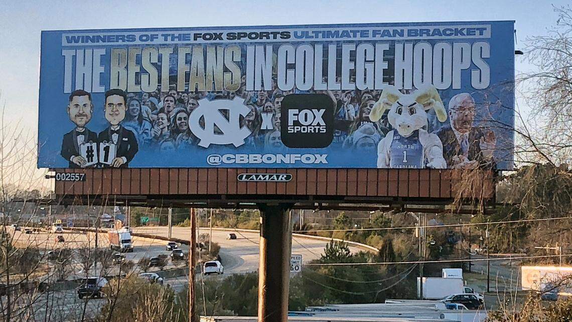 A billboard celebrating UNC basketball fans is located in the Durham, N.C., home of the rival Duke Blue Devils.