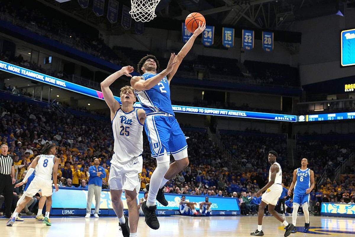PITTSBURGH, PA - FEBRUARY 10: Cayden Boozer #2 of the Duke Blue Devils lays up a shot against Nojus Indrusaitis #25 of the Pittsburgh Panthers in the first half at the Petersen Events Center on February 10, 2026 in Pittsburgh, Pennsylvania. (Photo by Mitchell Layton/Getty Images)