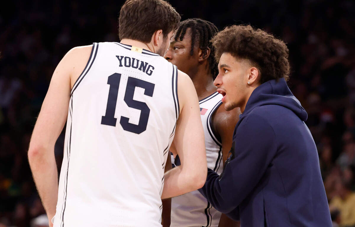 Duke’s Tyrese Proctor talks with Ryan Young (15) after a timeout during the second half of Duke’s 78-70 victory over Baylor at Madison Square Garden in New York City Wednesday, Dec. 20, 2023.