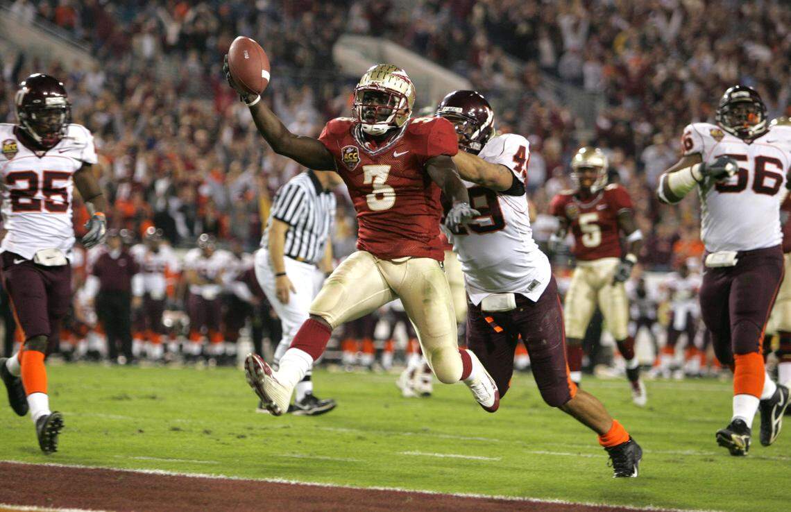 Florida State’s Leon Washington beats Virginia Tech’s Chris Ellis into the end zone to put the Seminoles up 17-3 in the third quarter of the inaugural ACC Football Championship game at Alltel Stadium in Jacksonville, Fla. in December 2005.
