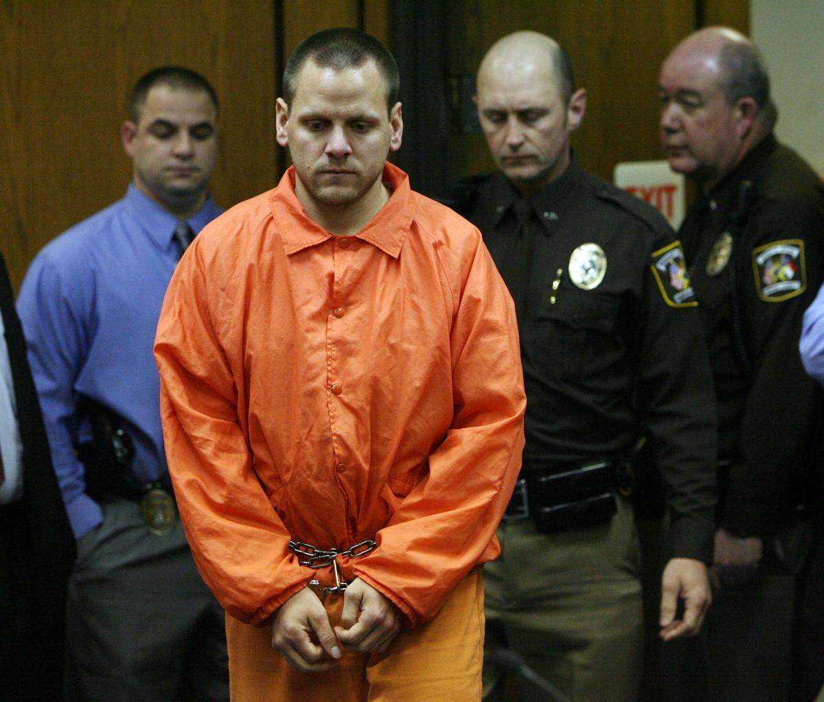 Flanked by law officers, Raven Abaroa, 30, makes his first appearance in Durham Superior Court in March 2010. Abaroa was extradited from Idaho to face charges of murder in the 2005 death of his pregnant wife, Janet.